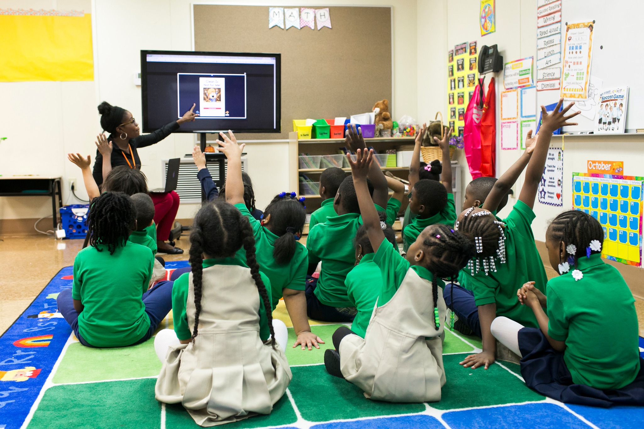 Buffalo classroom hands raised